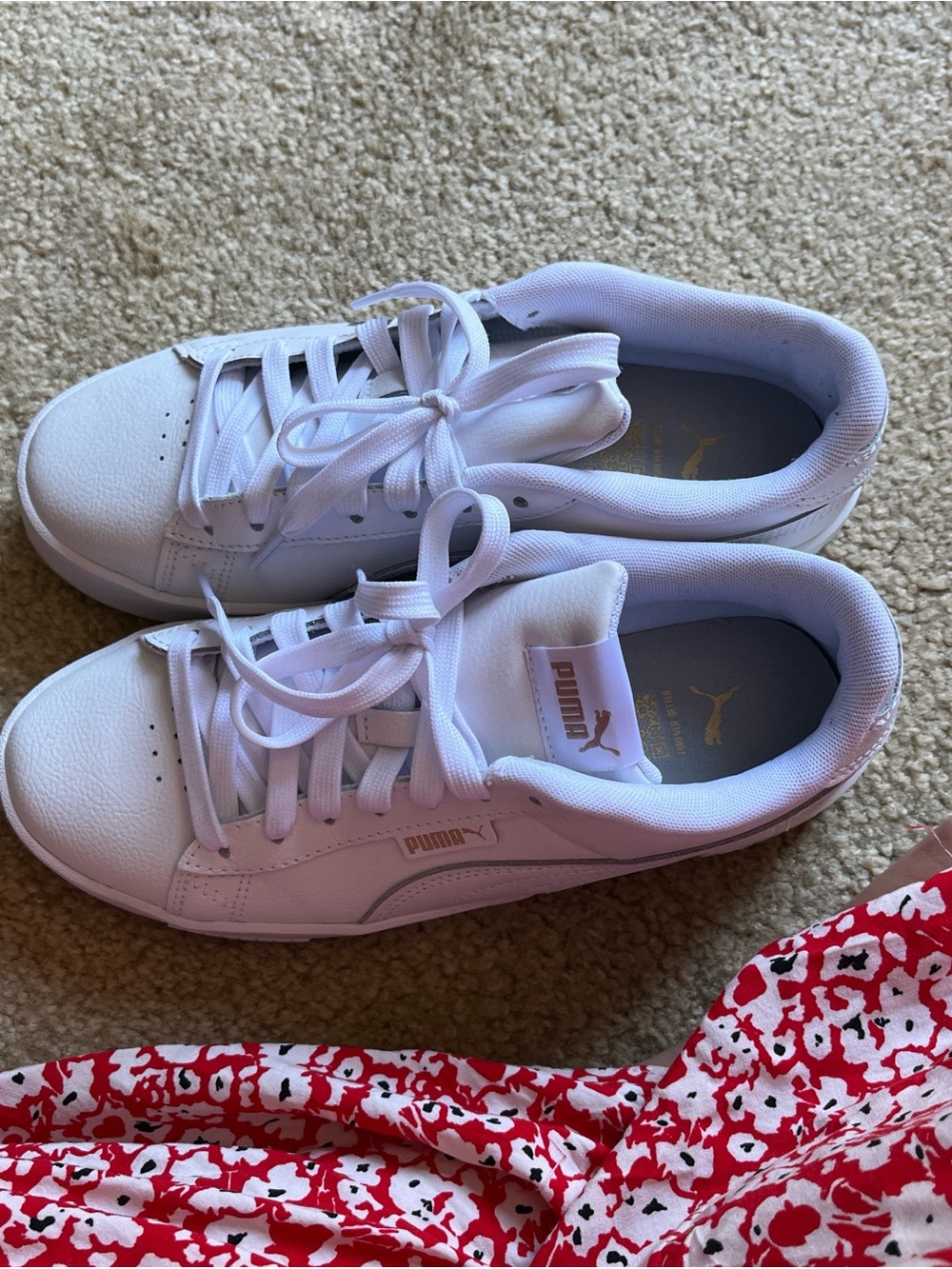 White Puma Sneakers with gold accents